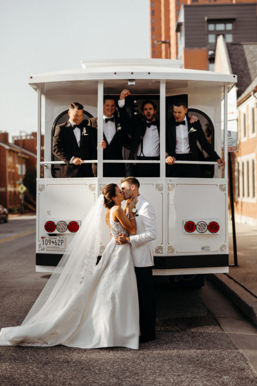 Image of couple in front of white trolley