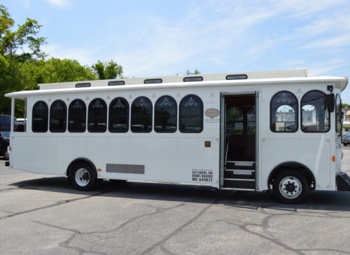 Image of exterior of white trolley on American Limousines website