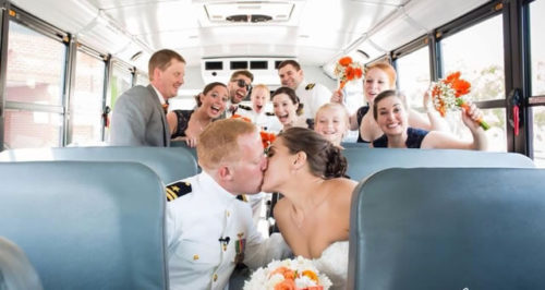 Couple and group of friends inside bus on American Limousines website